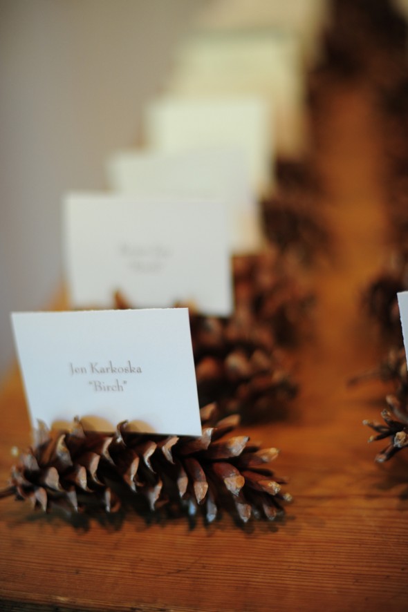 Pine Cone Place Card Holders At A Rustic Wedding