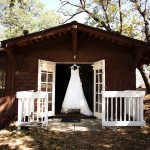 Wedding Dress Hanging From A Cabin At The Pine Hills Lodge