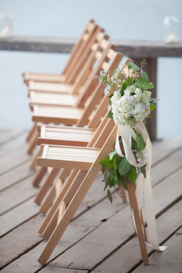 Country Flowers Tied Onto Wedding Chairs