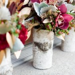 Rustic wedding flowers in birch vases